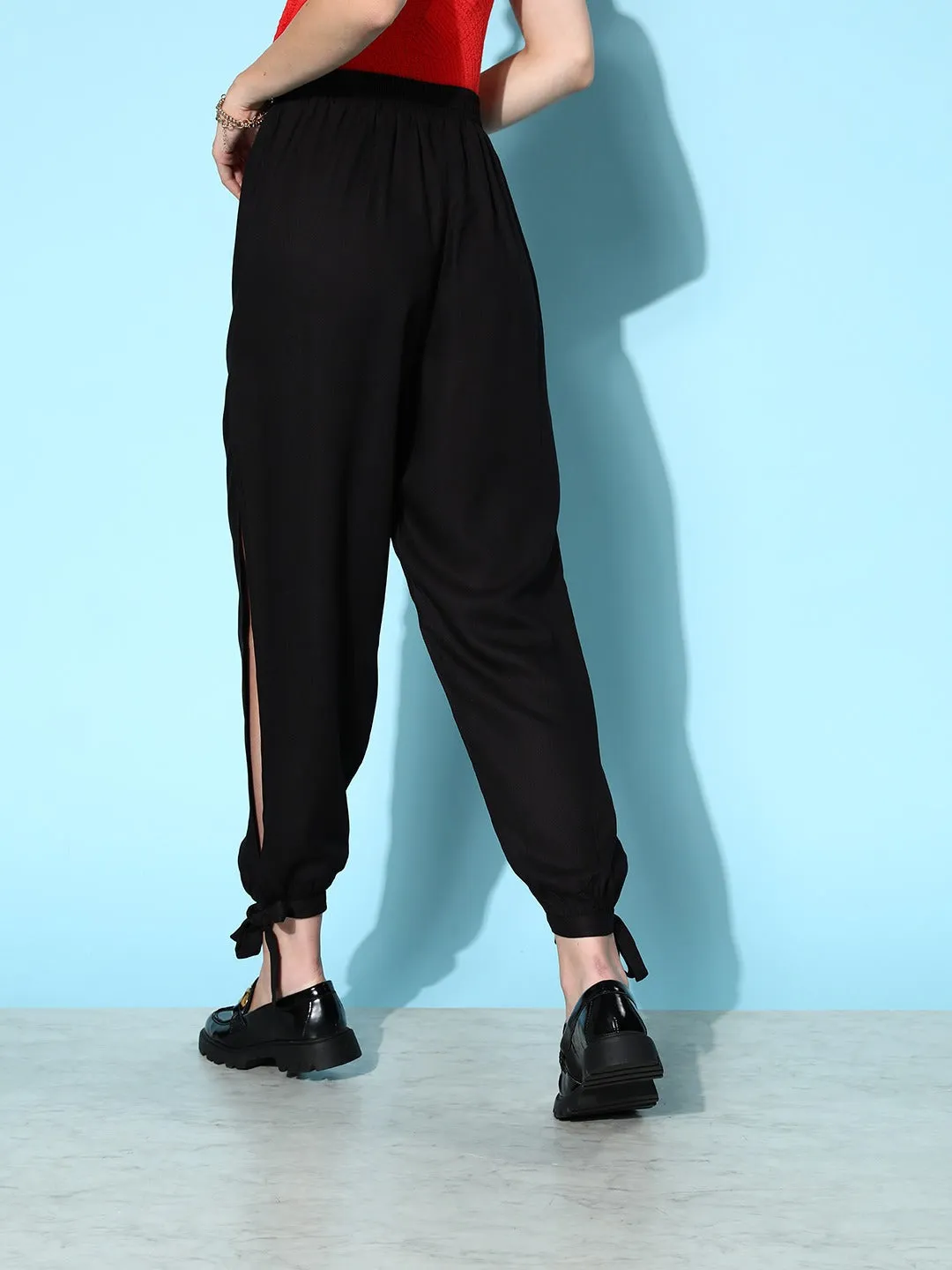 Berrylush Women Solid Black High-Rise Waist Thigh-High Slited Relaxed Trousers